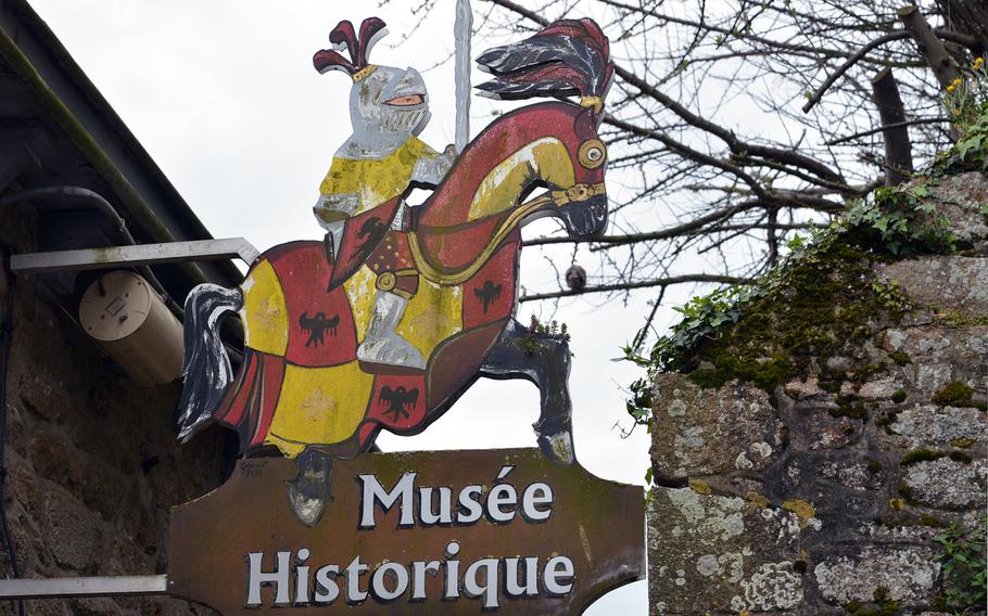 A knight on his steed marks the entrance to the Historic Museum at Mont-St-Michel. The museum traces the history of the island over the centuries.