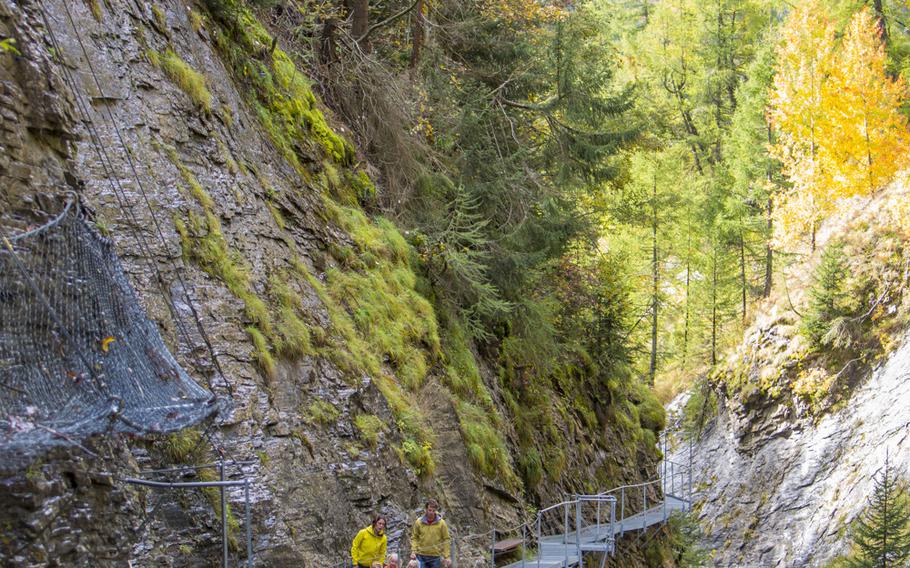 A 600-meter long trek mainly on metal walkways and stairs constructed high above a river runs along one side of the canyon in Leukerbad, Switzerland.