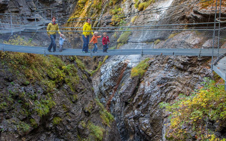 A breathtaking walk on a swaying metal suspension bridge high above a raging river is part of a 600-meter-long trek in Leukerbad, Switzerland.