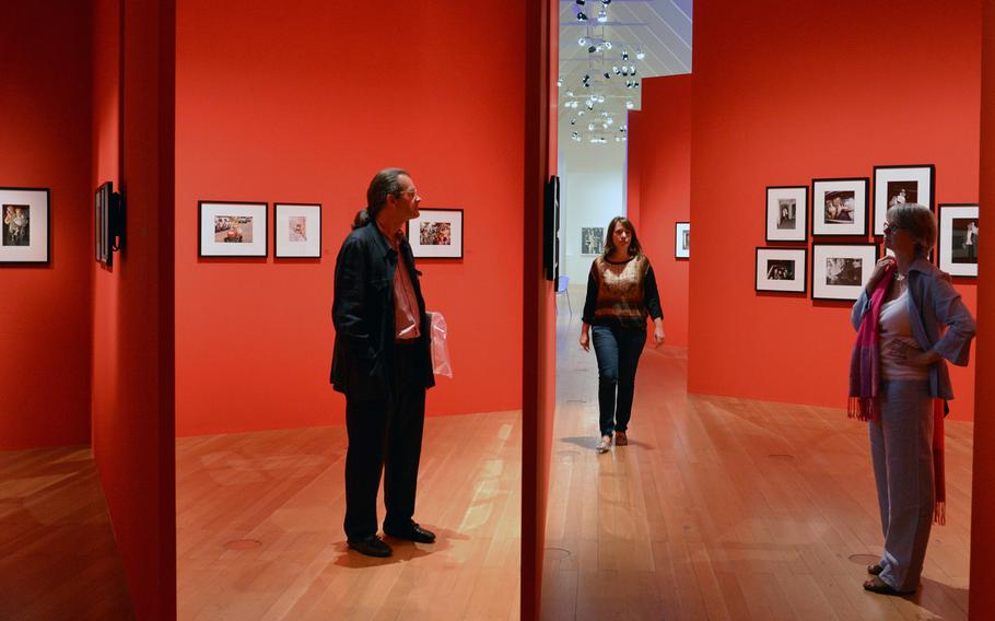Visitors check out the photographs in the Schirn's new exhibit.