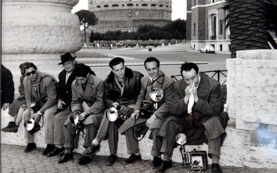 Photographers wait for Brigitte Bardot in Rome in 1963. The photo is on display at the Schirn's new exhibit "Paparazzi Photographers, Stars and Artists."  
