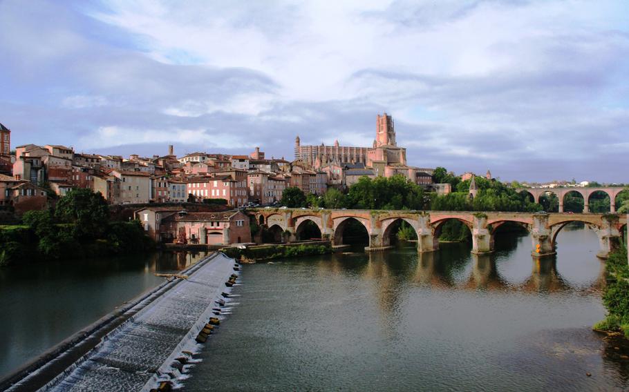 Charming old bridges and the majestic Ste. C??cile Cathedral combine for a postcard-perfect image of Albi, France, as seen from the Hotel Mercure. Albi is the birthplace of artist Henri de Toulouse-Lautrec.