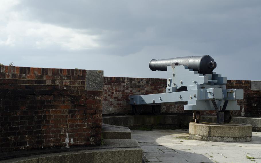 A cannon points out from Southsea Castle in Portsmouth, England. The castle was originally constructed by King Henry VIII as part of a massive defense overhaul and was later used as a defensive position for the British during the two world wars.