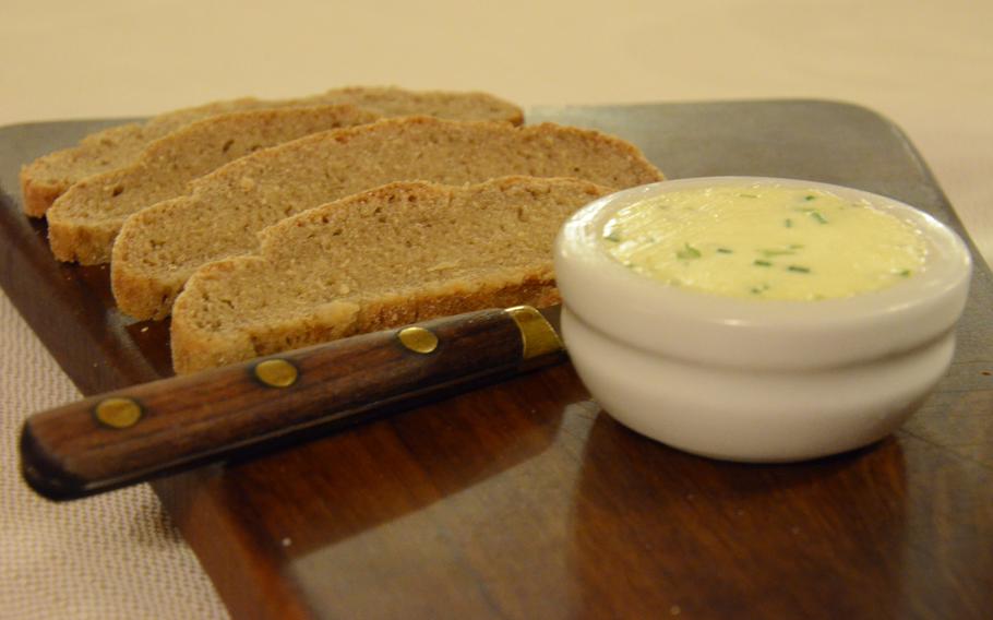 Soft and moist white flour bread accompanies a creamy chive-and-butter spread at Il Rifugio in Budoia, Italy. All of the breads served at Il Rifugio are baked at the restaurant.