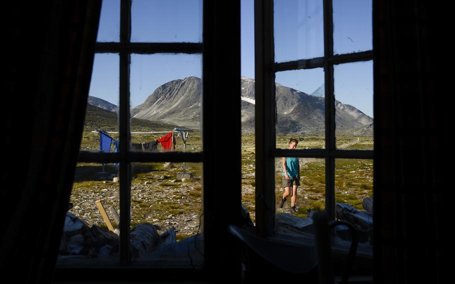 A view from inside the Amotsdalshytta hut in Dovrefjell National Park, Norway.