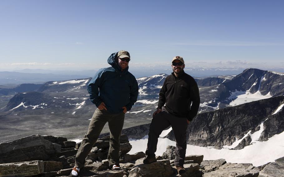 Stars and Stripes photographer Joshua L. DeMotts, left, and reporter Heath Druzin on the 7,500-foot summit of Snohetta in Dovrefjell National Park, Norway.
