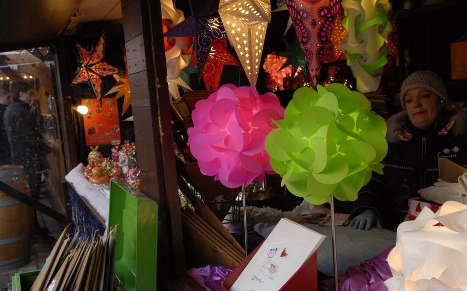 Colorful and decorative paper lanterns light up a stall at the Speyer Christmas Market in December 2013. The market typically opens in late November and is one of the handful in Germany to stay open for a few days after Christmas.