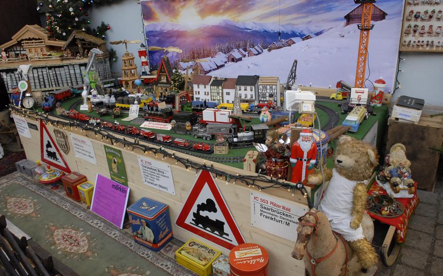 An impressive toy train set, on display in December 2013 at the Speyer Christmas Market, stood outside a vintage toy shop in Speyer, Germany.