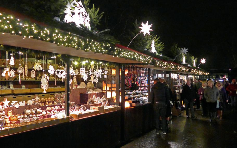 Holiday decorations adorn vendors' stalls at the European Christmas Market in Edinburgh, Scotland, in December 2013. 