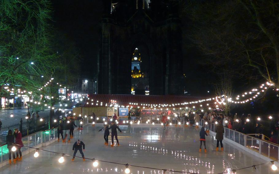 Skaters glide across the rink at Princes Street Gardens during last year's Edinburgh European Christmas Market. For 2014 there will be a second rink on St. Andrew Square where the Scottish Market takes place. 