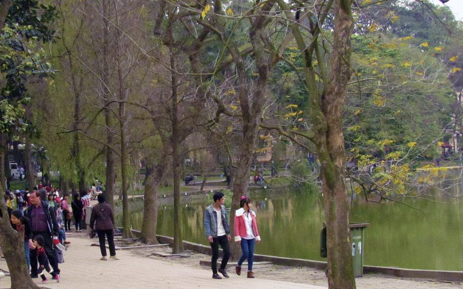 Hoan Kiem lake is the place to start in Hanoi. It wakes up before dawn as local residents flock there for tai chi or other exercise, and tourists soon follow.