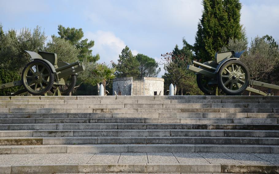 Two cannons flank the way to an observatory behind the chapel at the Military Sacrarium Redipuglia.