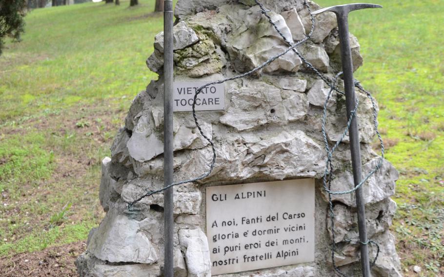 The tombstone of a member of Italy's Alpini, or mountain infantry corps, lies among other memorials at Remembrance Park.