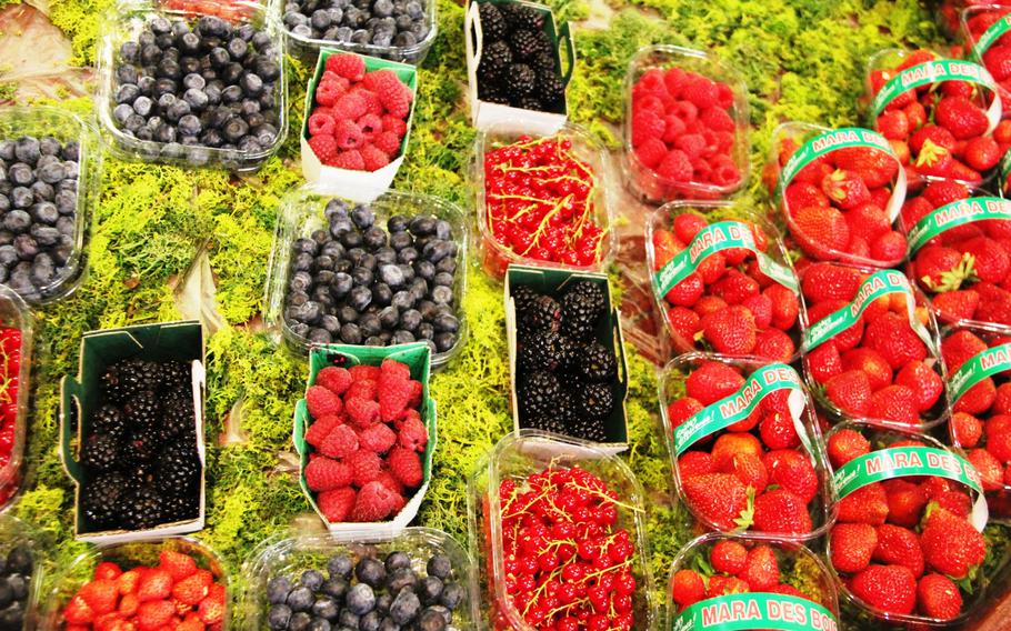 A profusion of berries makes for a colorful display at a Toulouse market.