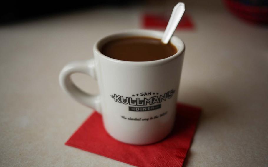 It looks like diner coffee, but don't at Sam Kullman's Diner in K-town, don't expect a happy waitress to wander around looking for empty cups to fill as they do in a real New York diner. 
