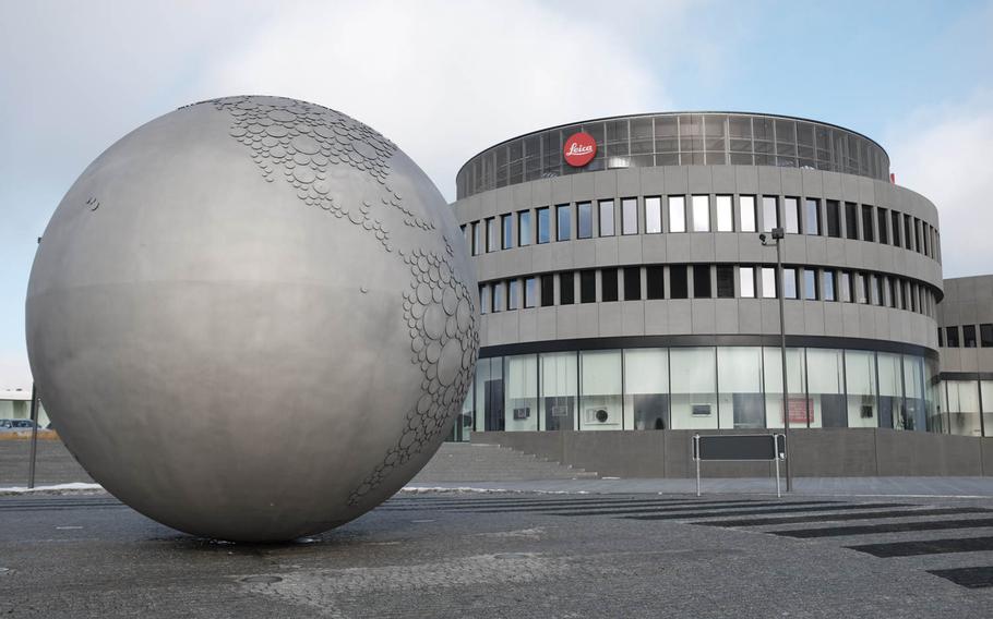 A metal globe rests in the center of the roundabout outside the entrance to the World of Leica, the Leica manufacturing and administrative complex, in Wetzlar, Germany, Jan. 6, 2015.

Joshua L. DeMotts/Stars and Stripes