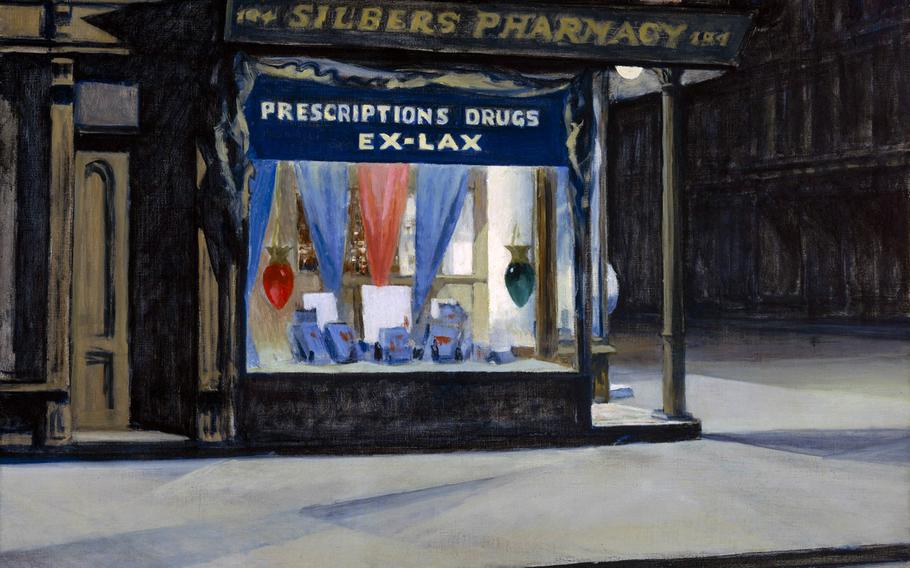 A painting by American artist Edward Hopper, titled "Drug Store," is one of 115 works in an art exhibit that tracks the idea of the evening and the night at Vicenza's municipal museum in the Basilica Palladiana.  