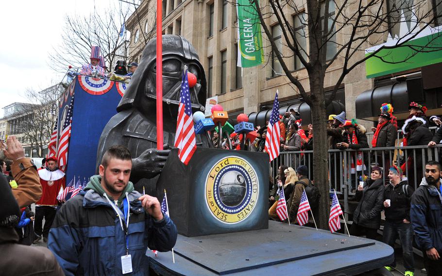 A float at the 2014 Cologne Rose Monday parade depicts Darth Vader as the Lord of the United States. Many of the parade's floats have political themes, and with the NSA scandal in Germany, the U.S. was a target of the skewering.