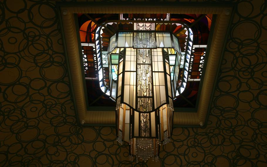 The patterns in this decorative light hanging in the Carnegie Library of Reims are typical of the Art Deco period, when much of Reims was rebuilt after WWI.