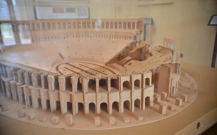 A scale model of the ancient amphitheater of Capua, past and present, is displayed inside the site museum in Santa Maria Capua Vetere, Italy. Built in the first century as a venue for gladiator competitions, the stadium was the second largest in ancient Rome after the Colosseum.