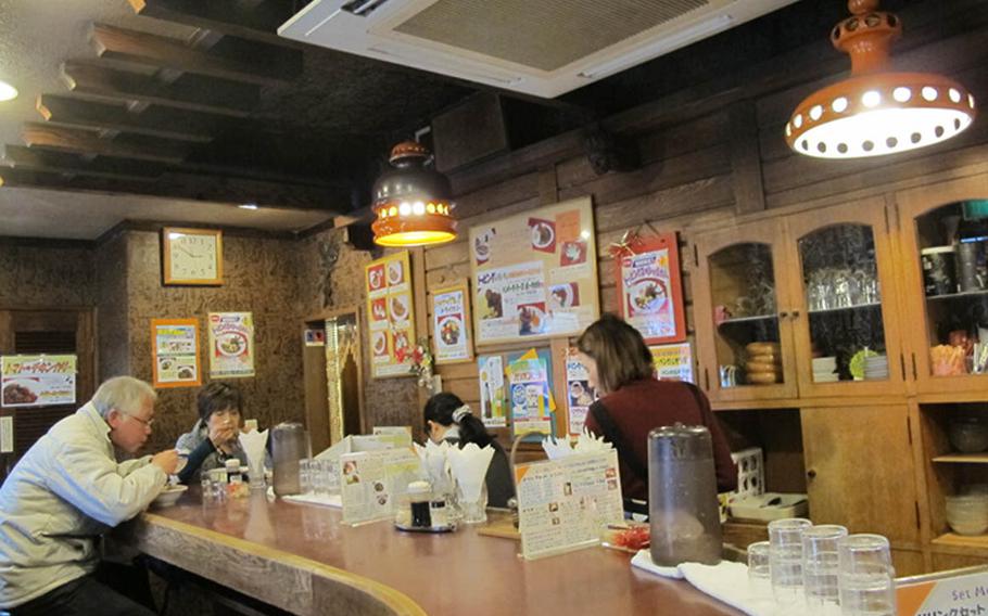 Bengal's counter and decor give the restaurant a nostalgic feel for its Japanese customers.