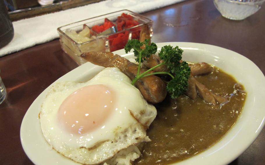 Beef curry with German sausage and a fried egg over rice is one of Bengal's mainstays.  