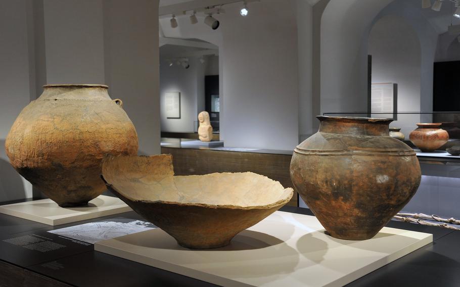 An urn and storage vessels from the Bronze Age, about 1300-1200 B.C. are on display at the Hesse State Museum in Darmstadt, Germany.