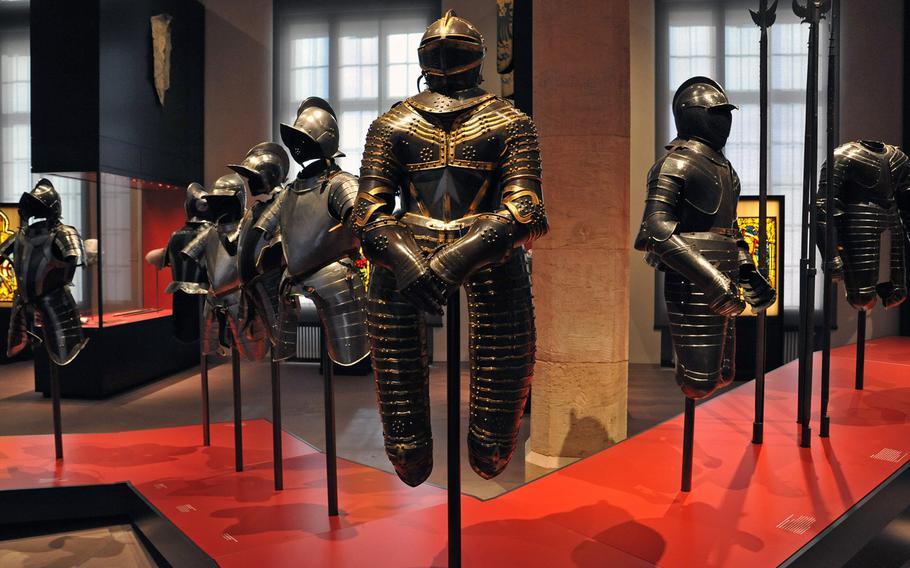 Medieval armor and weapons are on display at the Hesse State Museum in Darmstadt, Germany. At center is an officer's armor from the first third of the 17th century.