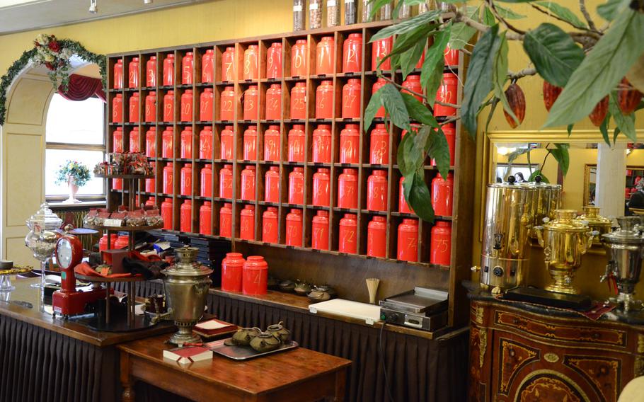 There's is more than just hot chocolate at Peratoner, a chocolate shop in Pordenone Italy. The 73 red canisters on this wall each contains a different type of tea.