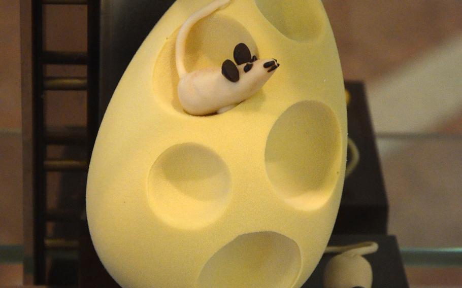 Peratoner, a chocolate shop in Pordenone, Italy, makes elaborate chocolate displays. Here, two edible mice decorate chocolate made to look like cheese.