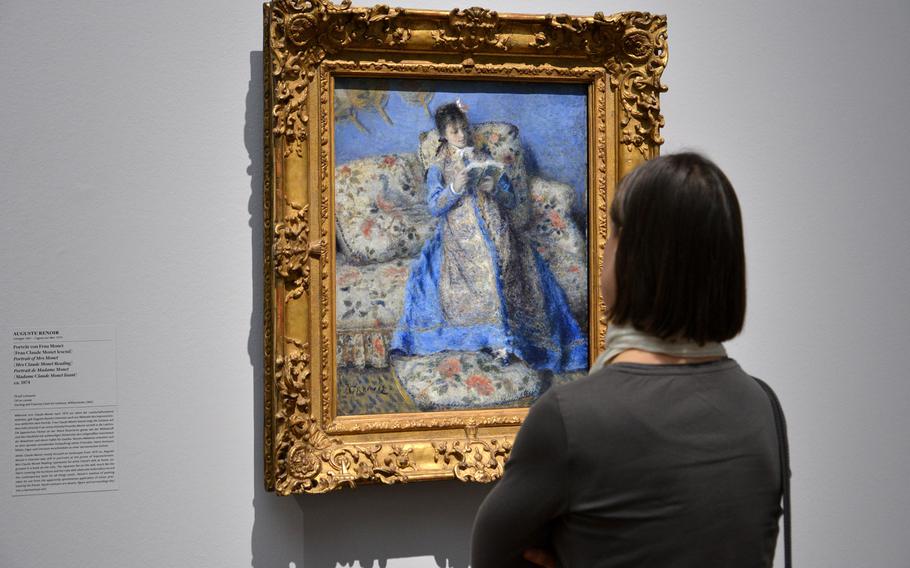 Auguste Renoir's "Portrait of Mrs. Monet (Mrs. Claude Monet Reading)" is on display at the "Monet and the Birth of Impressionism" exhibit at the Städel in Frankfurt, Germany