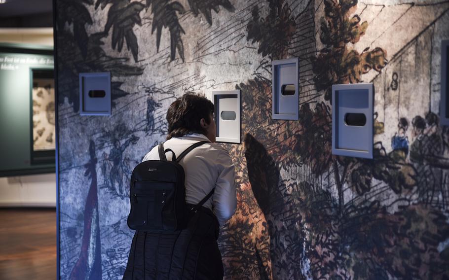 A visitor looks at one of the interactive displays at Hambach Castle. On May 27, 1832, the so-called Hambach Festival took place, at which 30,000 people from all over Germany, as well as France and Poland, gathered to demand democracy, freedom and a united Europe.