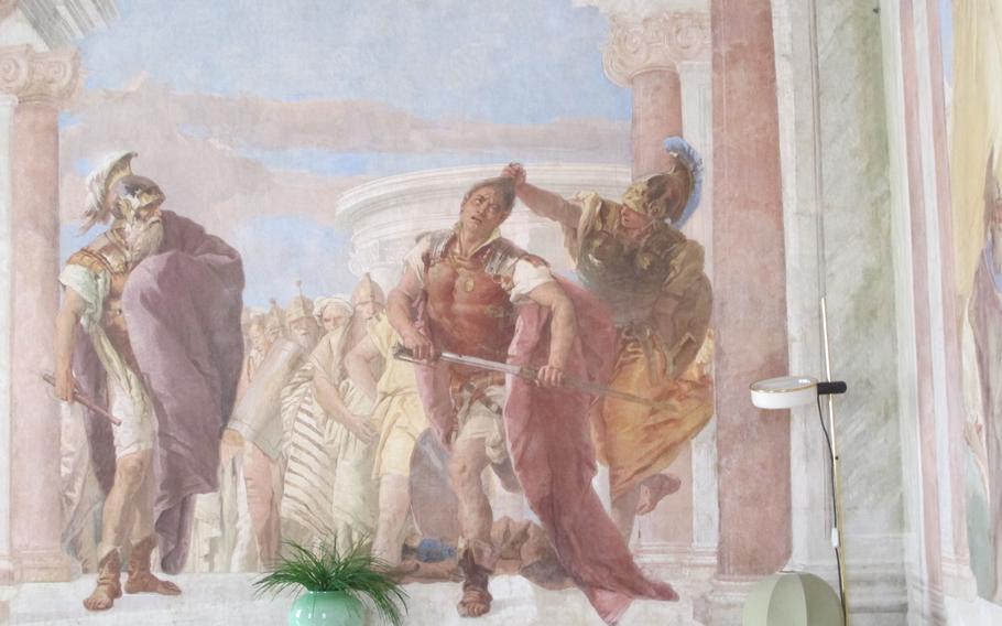 Giovanni Battista Tiepolo's fresco at Villa Valmarana ai Nani in Vicenza depicts the story of Achilles being held by his hair by the goddess of wisdom, Artemis. She is preventing him from attacking Agamemnon, who had stolen Achilles' slave girl.