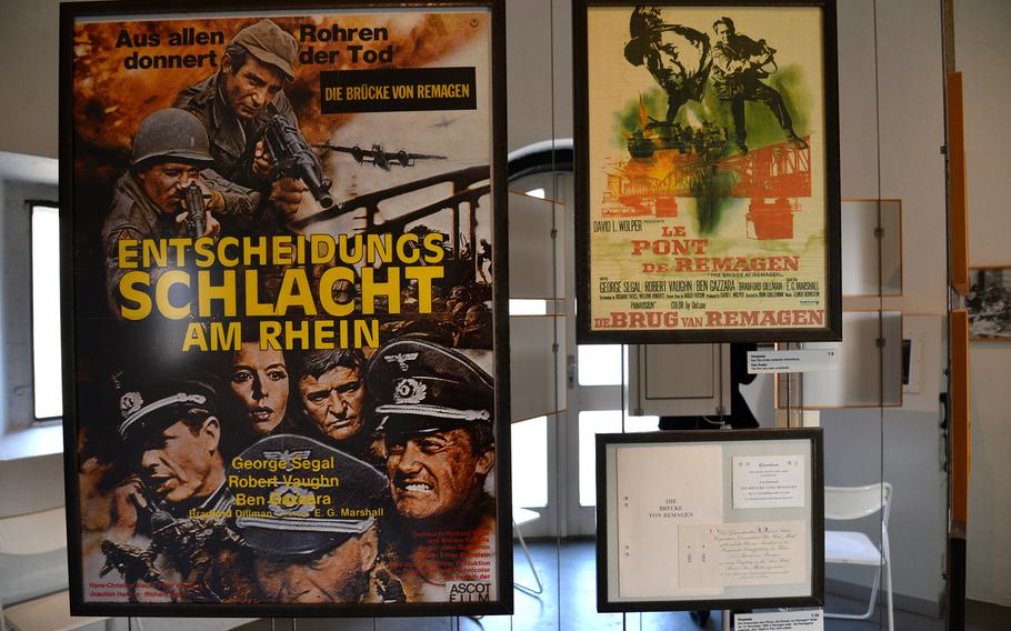 A German and a Belgian poster for the 1969 movie "The Bridge at Remagen," based on the book by Ken Hechler, is on display at the Peace Museum in Remagen, Germany. Filming of parts in Czechoslovakia was interrupted by the Soviet invasion of that country in 1968.