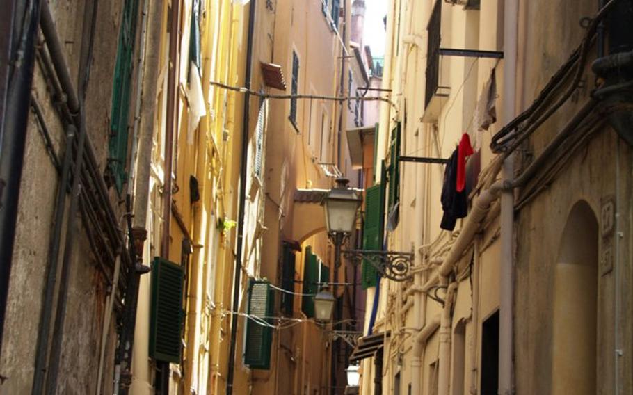 Climb the twisty alleys of the old town, La Pigna, in Sanremo, Italy.