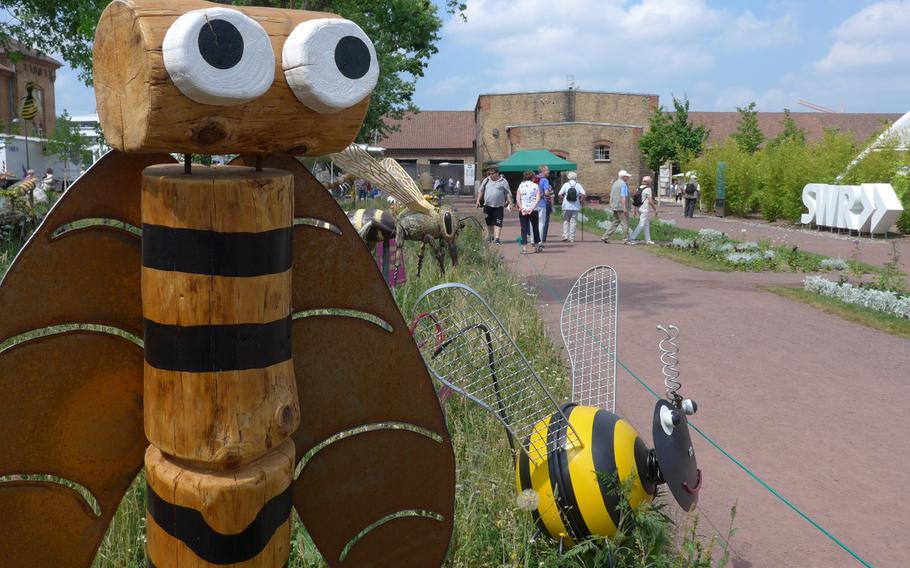 Bees made from a variety of materials are on display at the Landesgartenschau, or state garden show, in Landau, Germany.