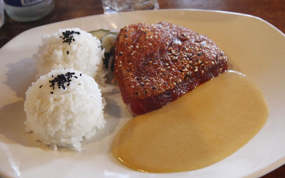 Seven-spice ahi tuna, with a papaya mustard sauce at Duke's Waikiki.