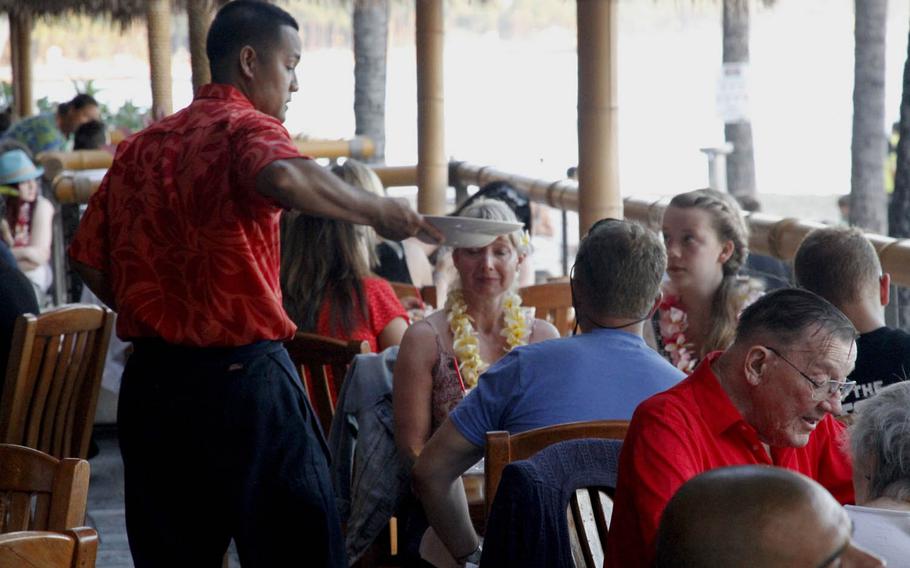 Lei all your troubles down and take a beachside seat at Duke's Waikiki restaurant.