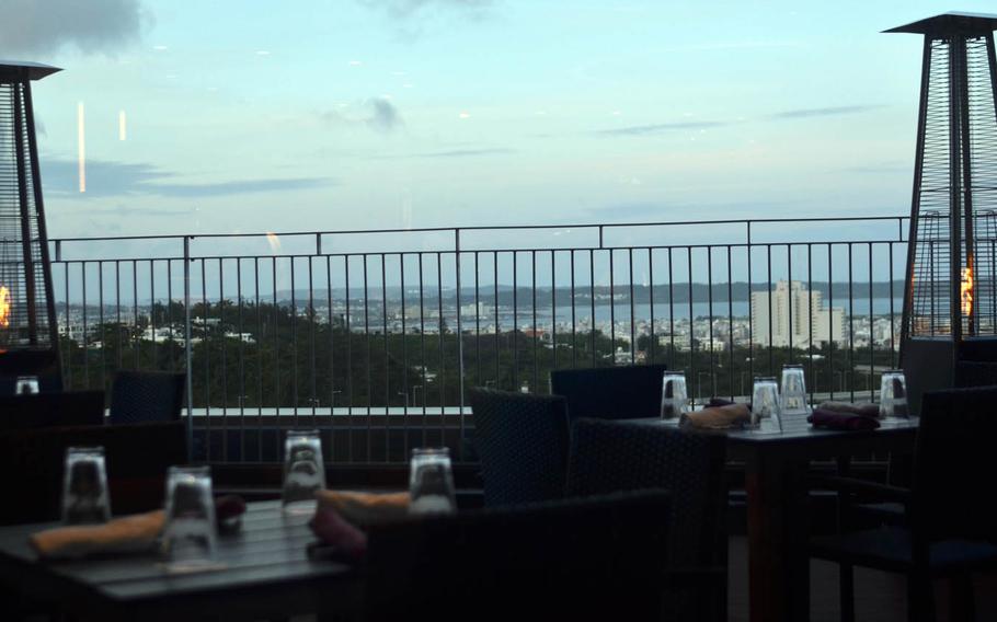 Diners at Roy's Hawaii in Okinawa may enjoy a view of Awase village and the Pacific Ocean.