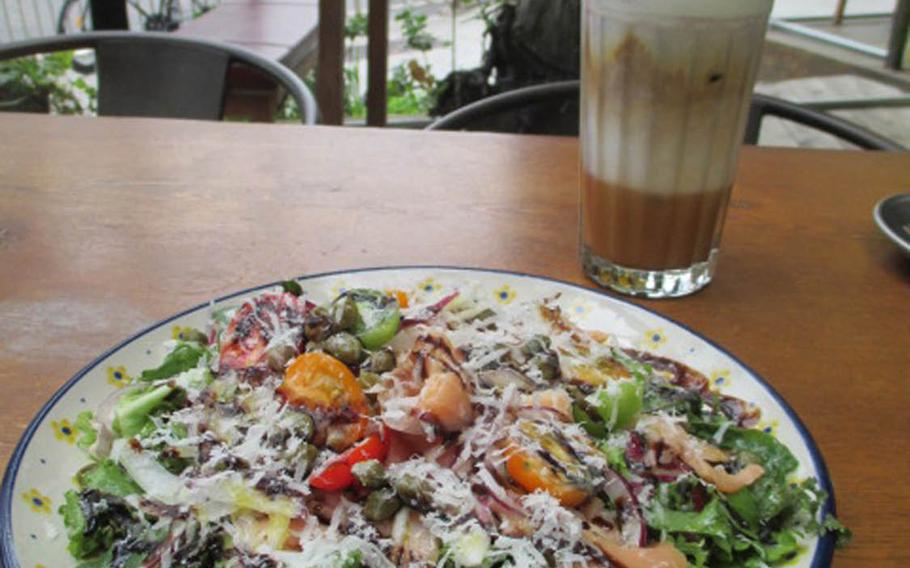 A salmon salad, a caramel macchiato and a view from the patio at Bermuda, a bar-restaurant in Itaewon across the street from U.S. Army Garrison Yongsan in South Korea.