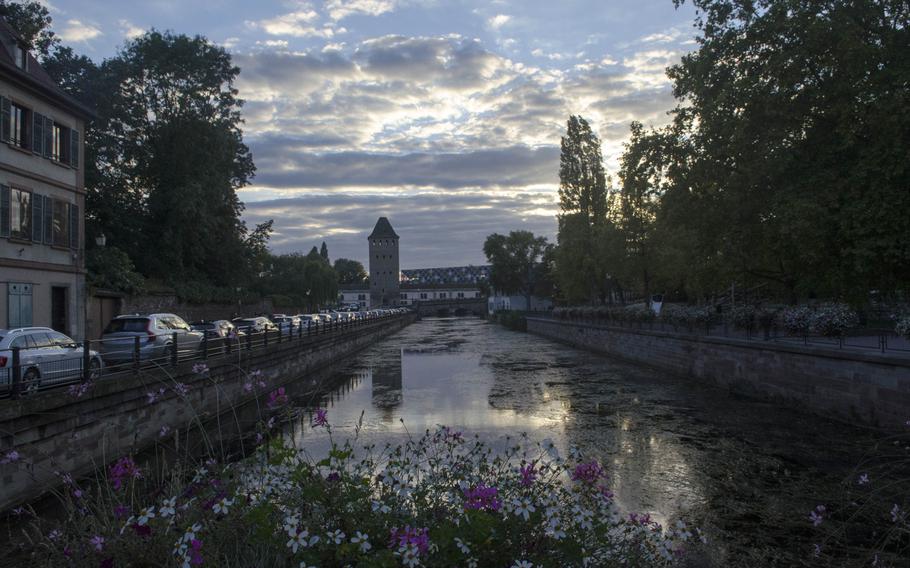 A view along one of Strasbourg's canals near sunset, Sunday, Sept. 27, 2015. The city, one of the oldest and most historically significant in Europe, is now a major European Union legislative center.