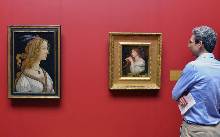 The Staedel's "Idealized Portrait of a Lady" by Sandro Botticelli, is seen at left, paired with "Fazio's Mistress" by Dante Gabriel Rossetti from the Tate, London, at the "Masterworks in Dialogue" exhibit at the Staedel in Frankfurt, Germany.