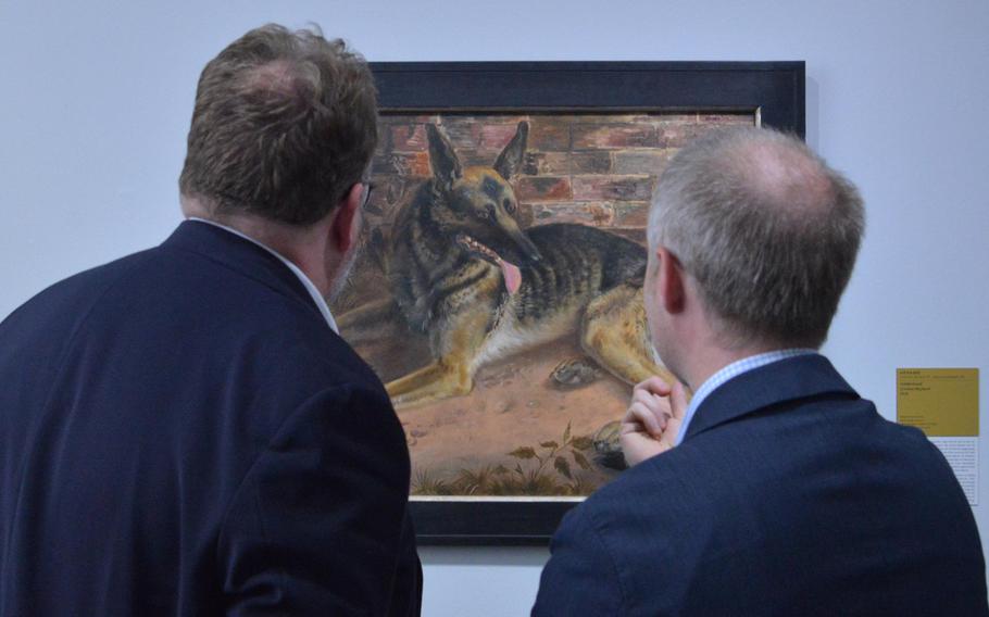 Visitors to the "Masterworks in Dialogue" exhibit at the Staedel in Frankfurt, Germany, view Otto Dix's "German Shepard." To celebrate its 200th anniversary, the museum brought masterpieces from other museums to display with works of its own. This work belongs to the museum.