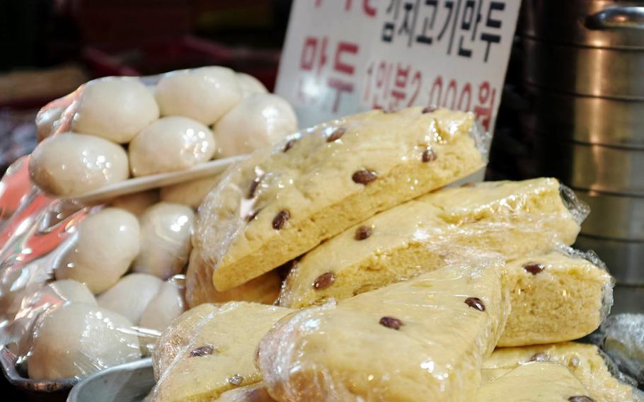 Sweets are common offerings for many booths at Tong Bak Market in Pyeongtaek, South Korea. This cake-like bread has a sweet red bean topping.