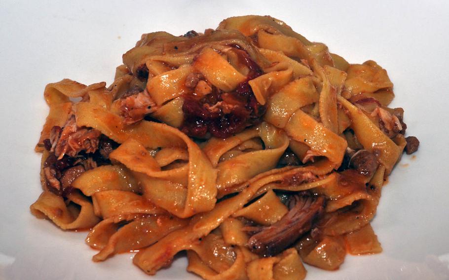 Tagiatelle with a sauce featuring rooster meat is a first-course offering served recently at Trattoria Da Carmelo in Pasiano, Italy.