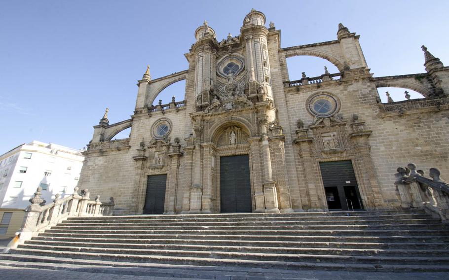 The Cathedral of San Salvador in Jerez, Spain, is located near the city center. A church treasury is open to tourists inside, and the cathedral has numerous, elaborate altars.