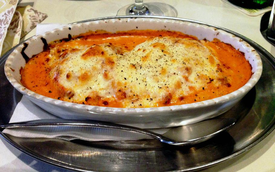 A lunch entree of baked lasagna is served at La Nave, an Italian restaurant and pizzeria in Alzey, Germany. The restaurant offers familiar Italian and German entrees with exceptional service.