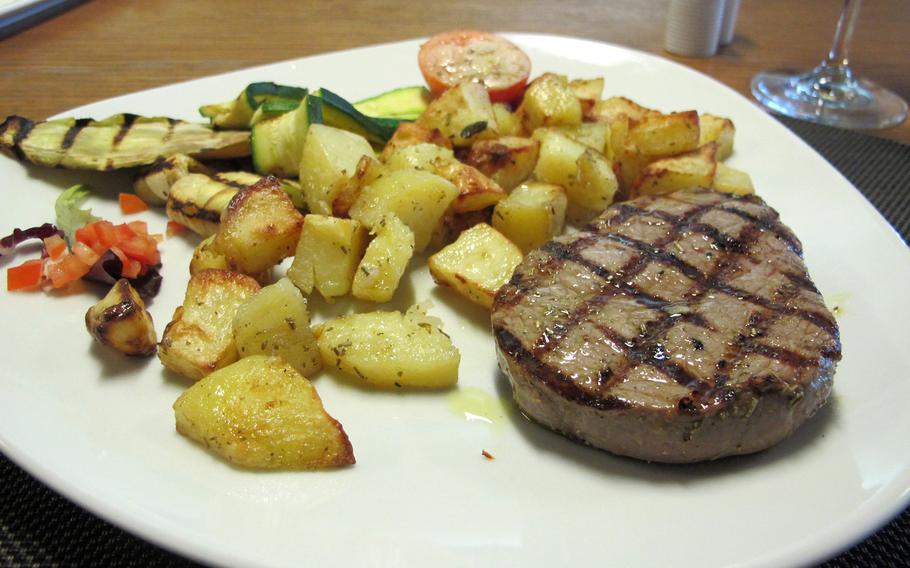 Steak and potatoes Italian style at Julien in Vicenza, Italy, is a simple but fulfilling dish.