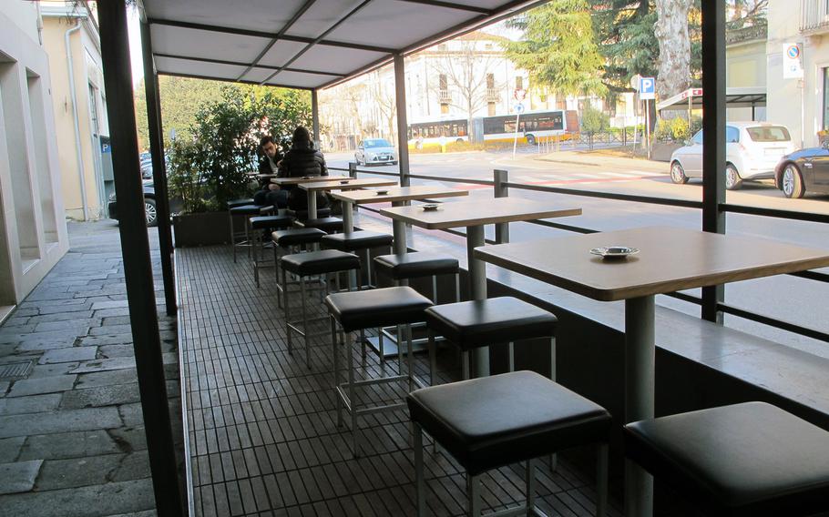 Outside seating at Julien in Vicenza, Italy, overflows in the summer and attracts some patrons even in January.