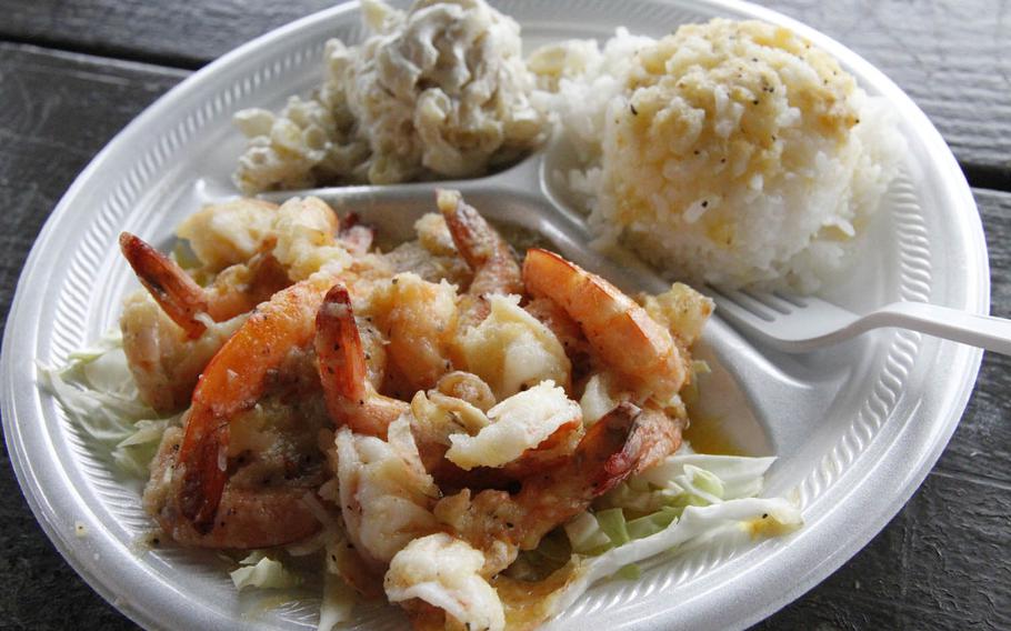 A steaming plate of garlic shrimp from Famous Kahuku Shrimp Truck, one of the many rustic eateries on the North Shore of Oahu specializing in locally grown shrimp.